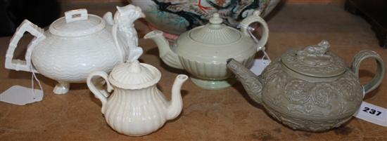 Belleek three-legged teapot with griffin spout, Wedgwood small drabware pot & 2 other small teapots